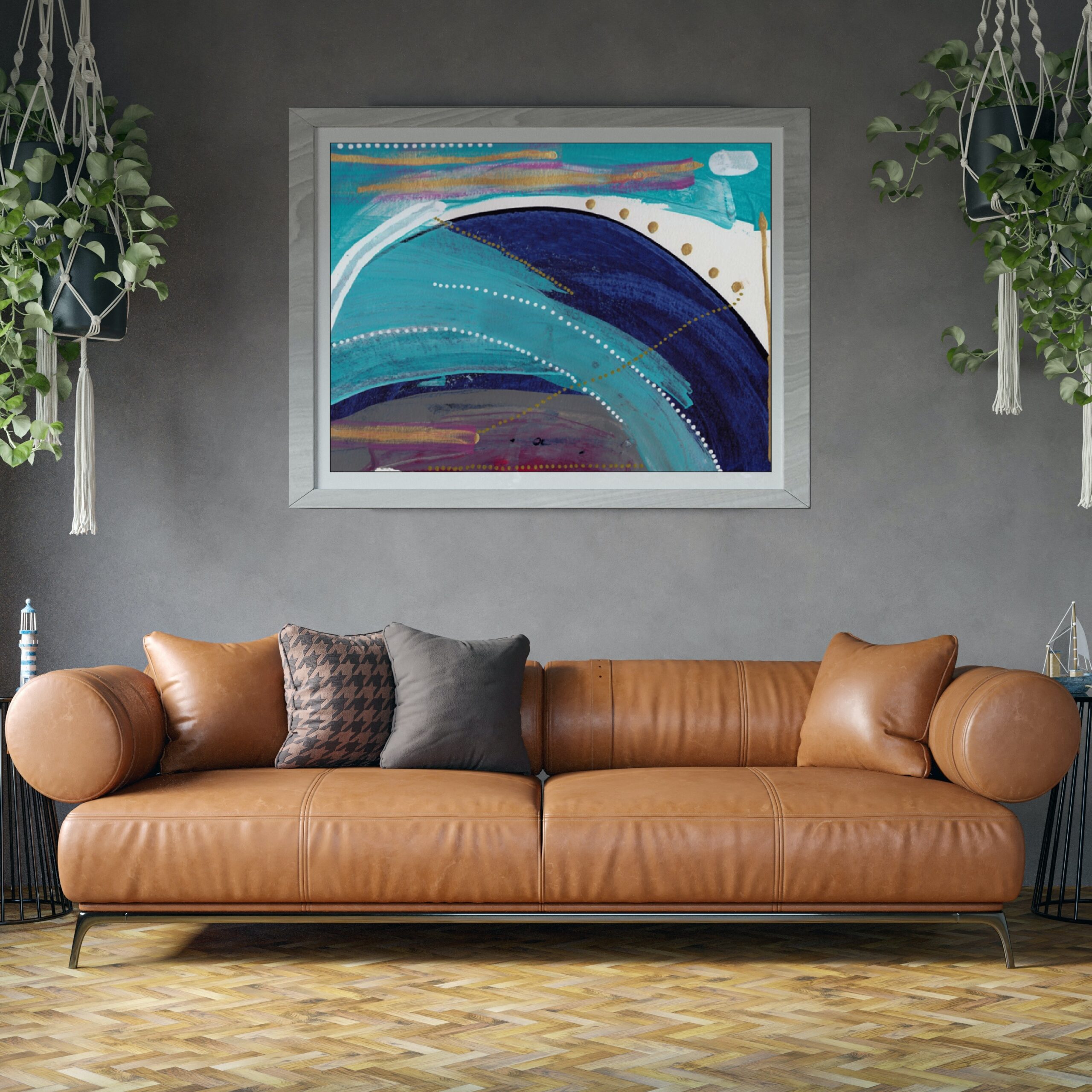 blue abstract art over brown couch